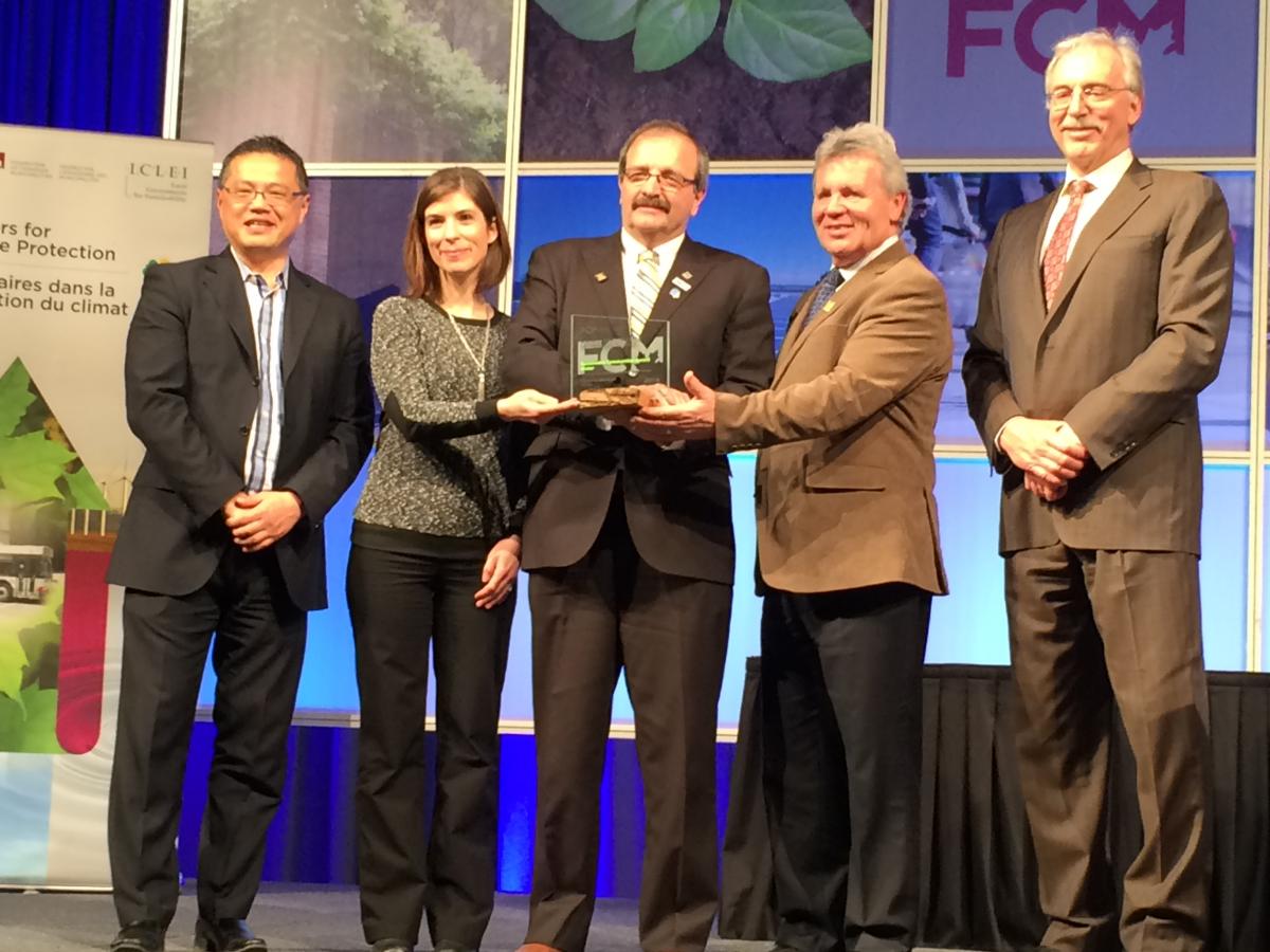 Mayor Robertson accepting the FCM Sustainable Community Award in 2015