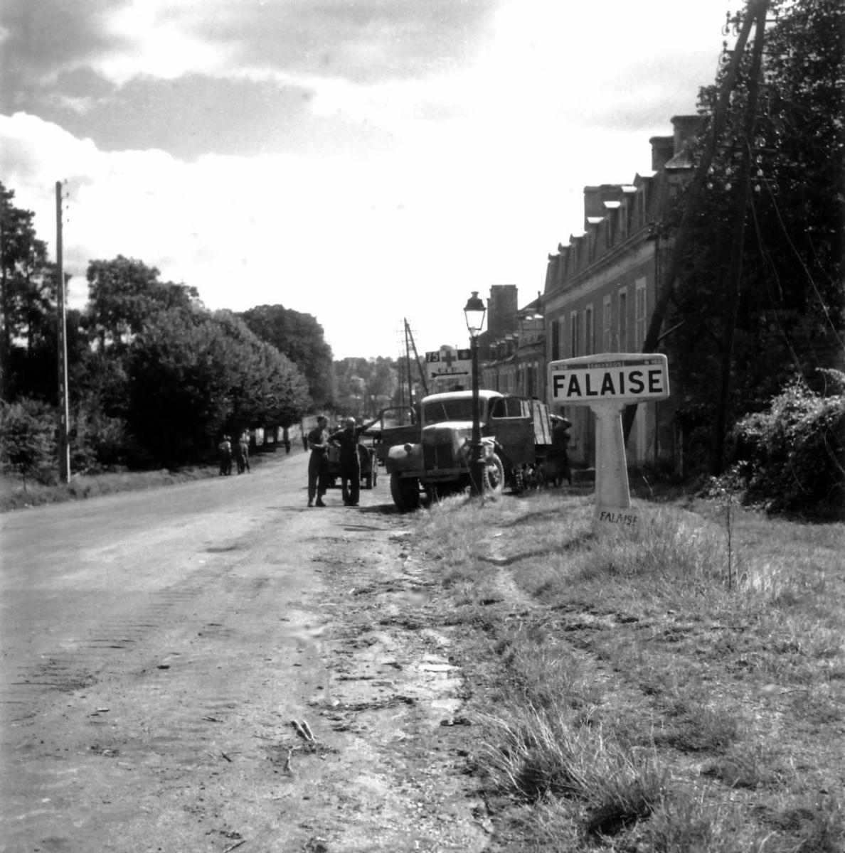 A sign marks the entrance to the city of Falaise in France.