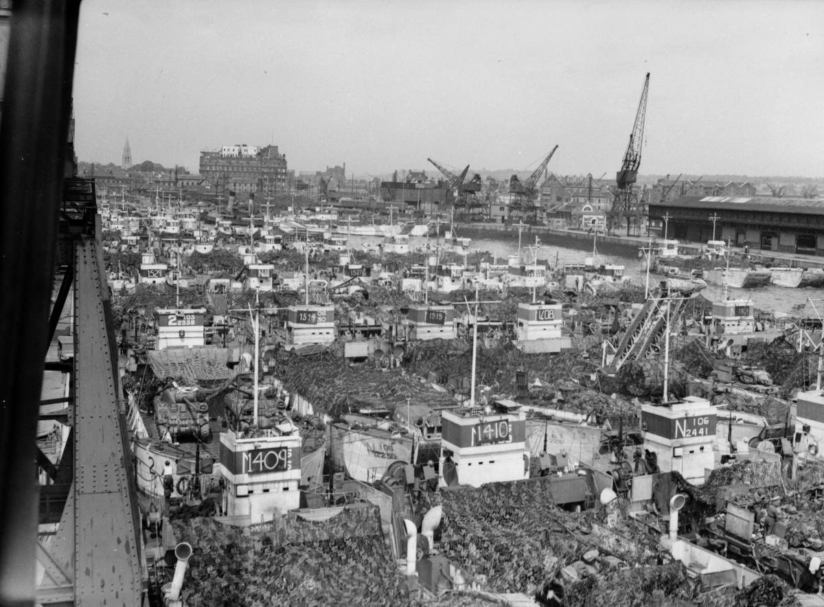 Overhead photo showing landing crafts and tanks ready for the invasion at Normandy.