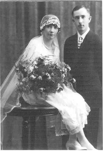 Black and white wedding photograph of a man and woman from 1928.