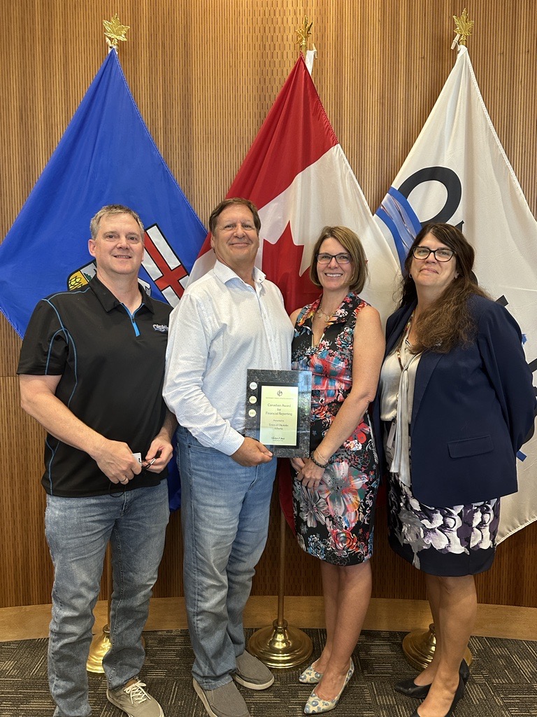 Picture of Council and staff with CAnFR award