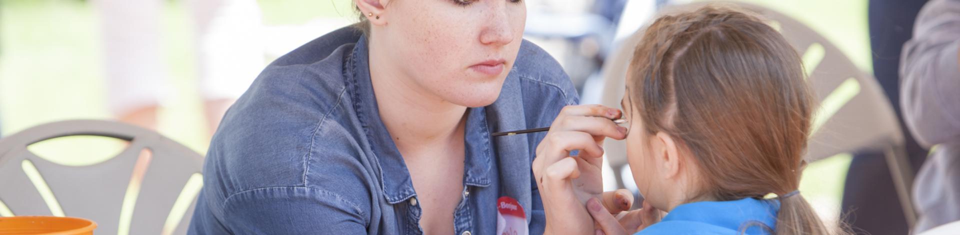 Young face painter