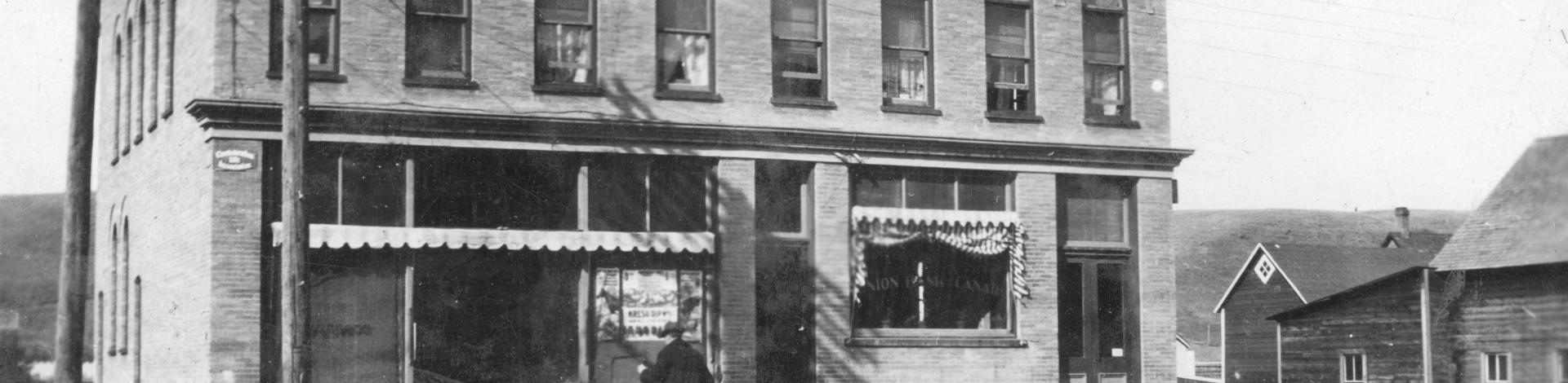 black and white image of historic building in Okotoks