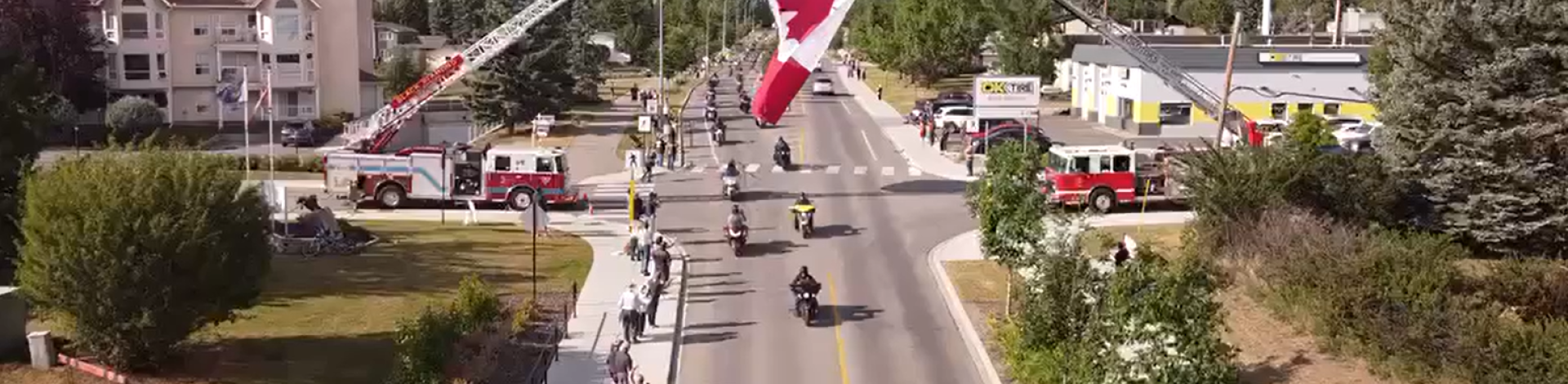 Rolling Barage motorcycle procession driving down Veterans Way