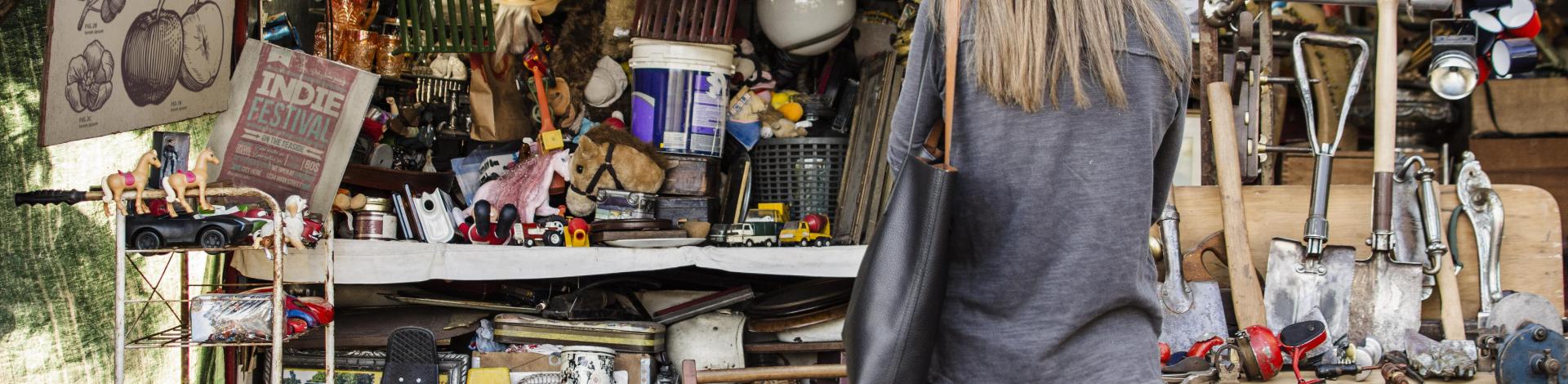woman-searching-something-buy-garage-sale