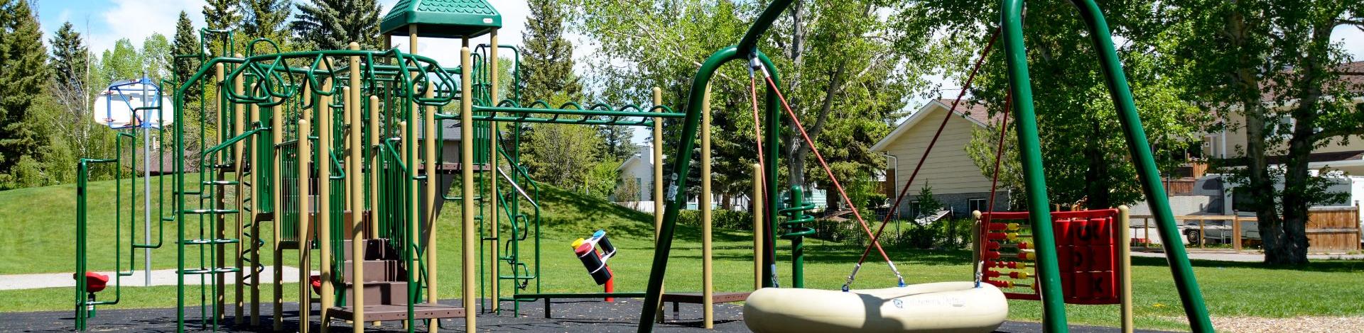 Playgroung structure in Cedar Grove Park, Okotoks