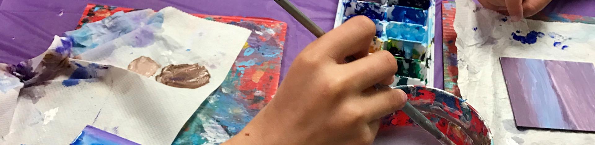 many hands painting