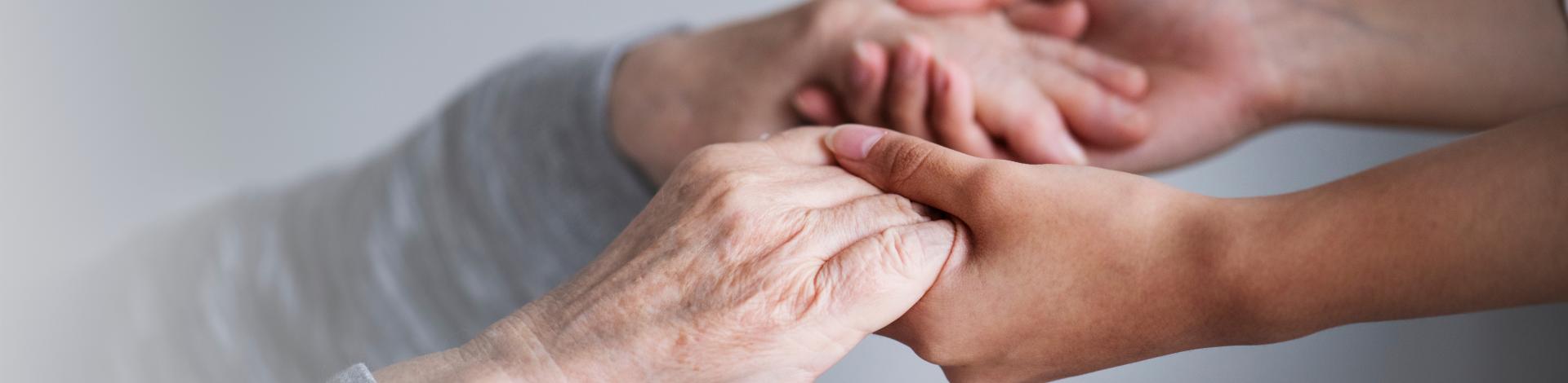 hands stretched to hold another 