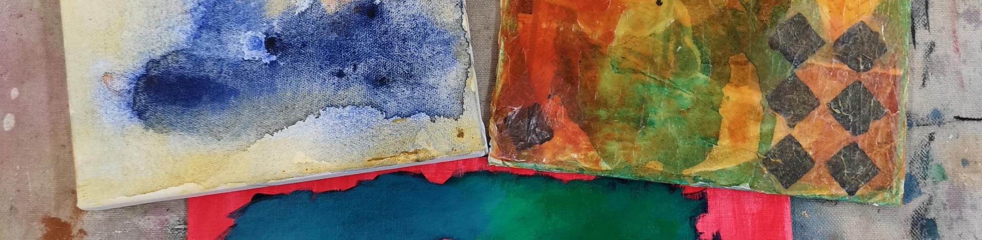 Three samples of artwork using different mediums.