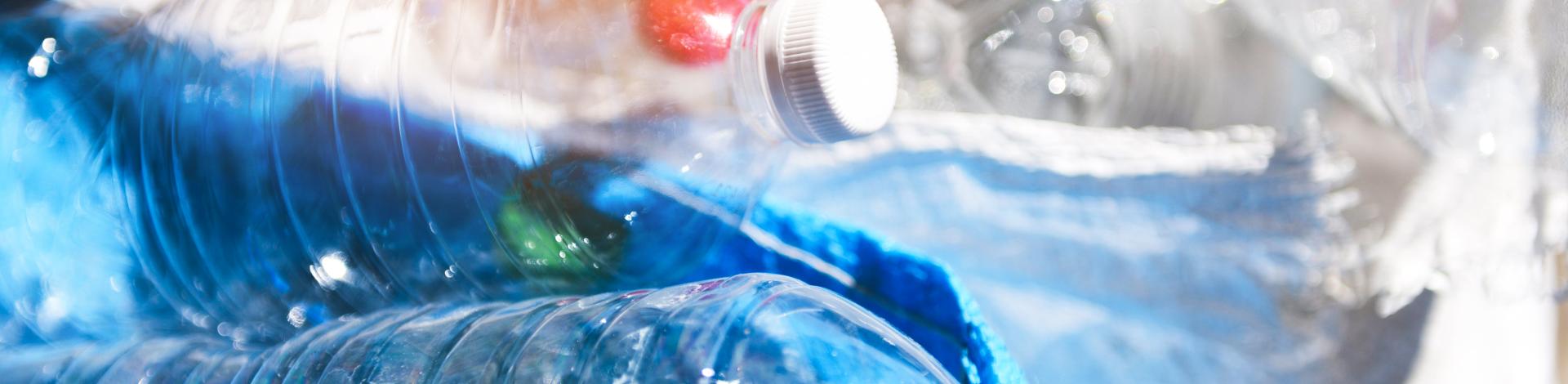 A close up of a plastic drinking bottle