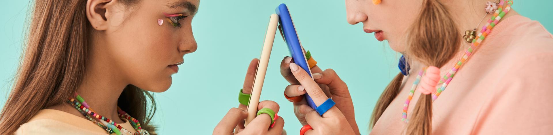 youth looking at phones