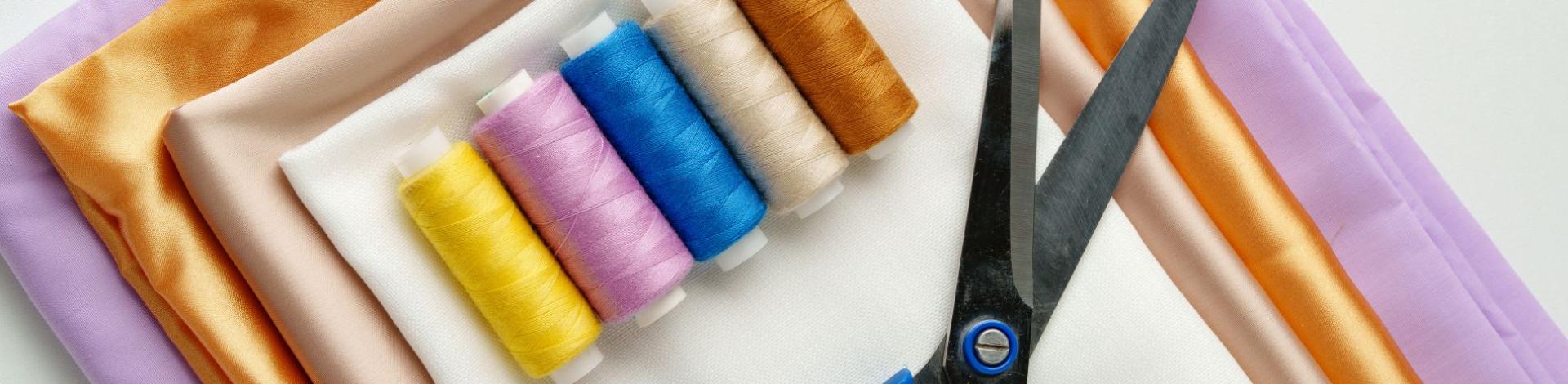 Textiles, yarn and scissors