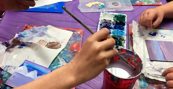 many hands painting