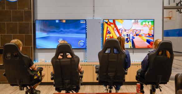 teenagers playing video games