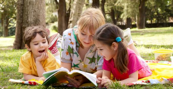 family reading in the summer