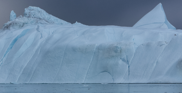 Scenic view of frozen lake against sky