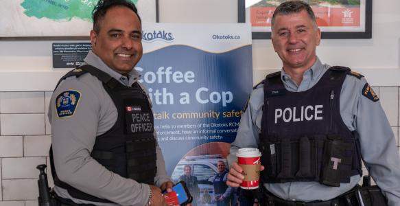 Okotoks RCMP and Municipal Enforcement at Coffee with a Cop Event
