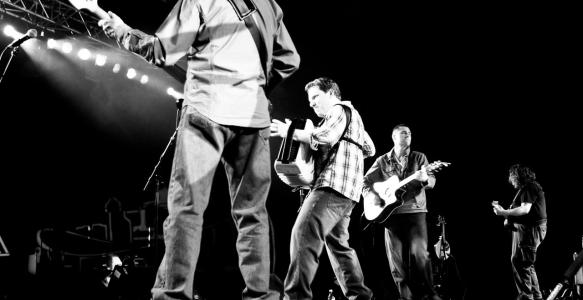 a celtic band on stage in blacka and white