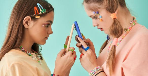 youth looking at phones