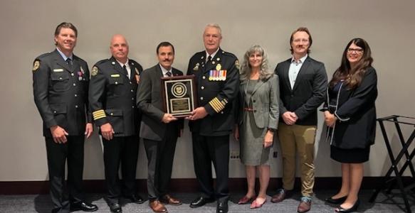 Fire & Rescue accreditation team posing with award