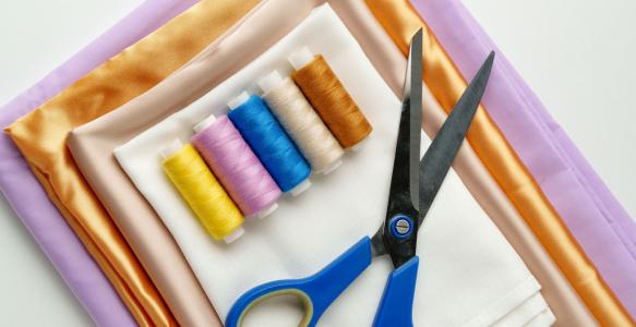 Textiles, yarn and scissors