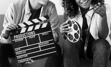 young-women-with-movie-film-reel