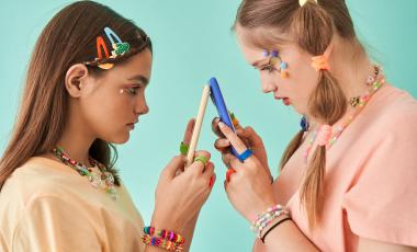youth looking at phones