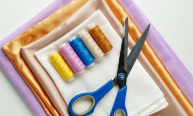 Textiles, yarn and scissors
