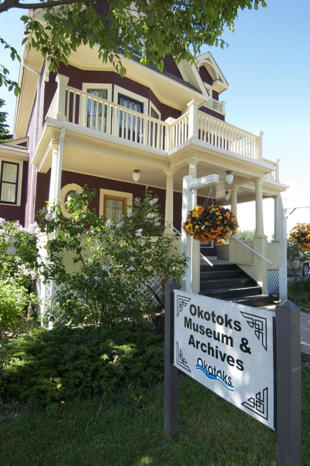 Okotoks Museum and Archives front of house with sign