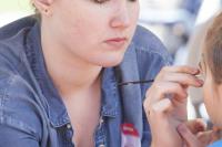Young face painter