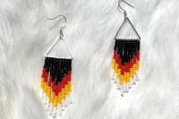 Black, red, yellow, and white beaded earrings.