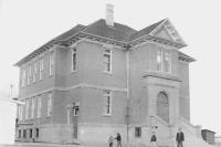 an large old school in okotoks