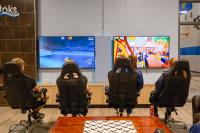teenagers playing video games