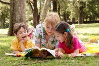 family reading in the summer