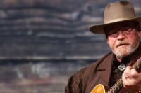 a musition with a guitar