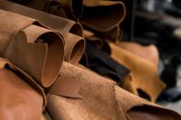Different pieces of leather in a rolls.