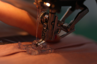 a close up of a sewing machine in use