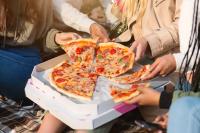 close-up-take-away-pizza-teenagers-hands