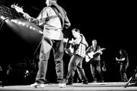 a celtic band on stage in blacka and white