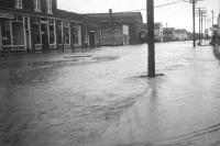 an old photo of a flood in okotoks