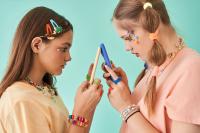 youth looking at phones