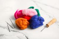 Colorful wool roving with felting needles