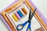 Textiles, yarn and scissors