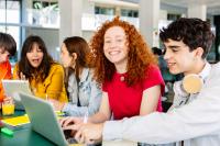 Happy young group working together