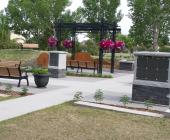 Okotoks Cemetery shot of benches and customized family plot