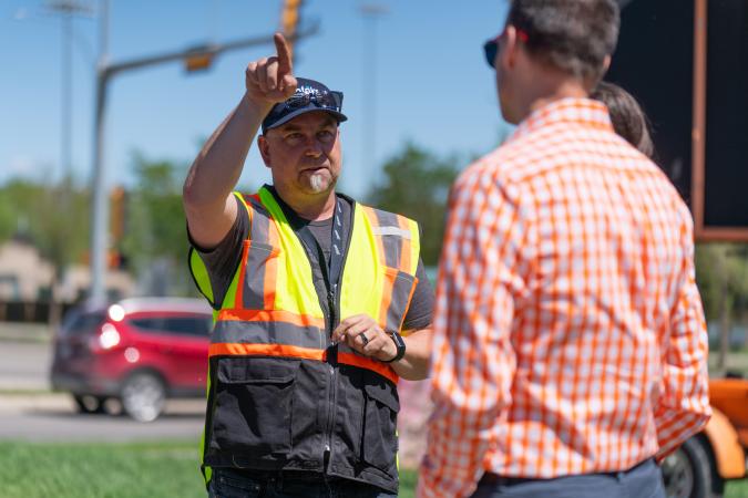 a man points a equipment 