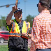 a man points a equipment 