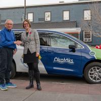 Mayor Thorn and Okotoks Lions Club president Stewart Thomas in front of new transit van donated by the Lions Club