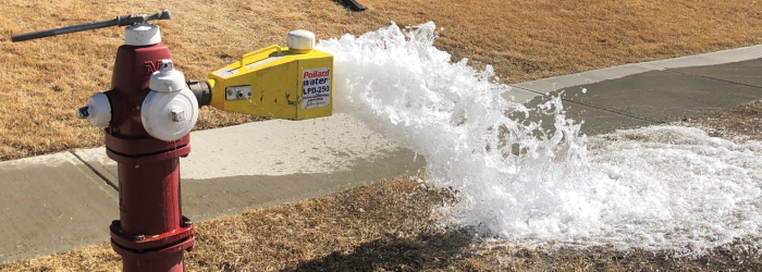 fire hydrant being flushed