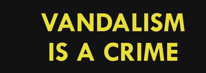 banner saying vandalism is a crime